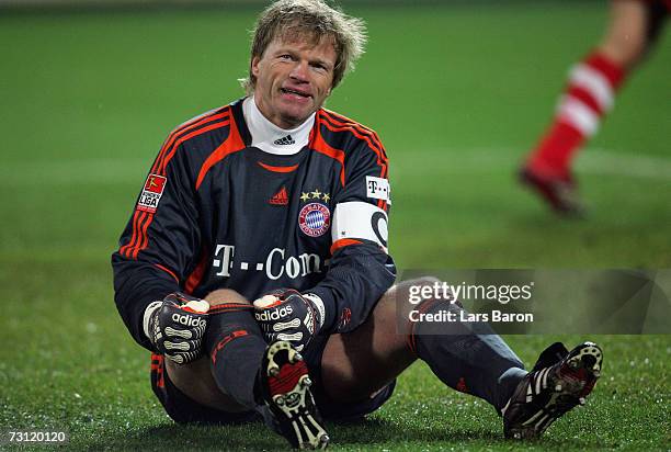 Goalkeeper Oliver Kahn of Munich sits dejected on the pitch after the second goal of Alexander Frei during the Bundesliga match between Borussia...