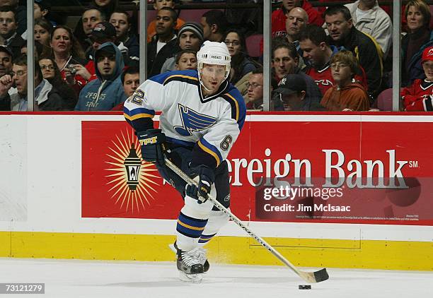 Martin Rucinsky of the St. Louis Blues skates with the puck against the New Jersey Devils on January 10, 2007 at Continental Airlines Arena in East...