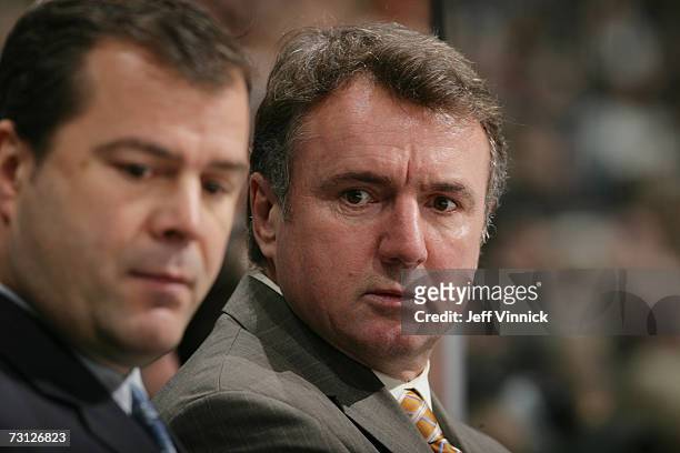 Assistant coach Rick Bowness of the Vancouver Canucks looks on against the Dallas Stars at General Motors Place on January 3, 2007 in Vancouver,...