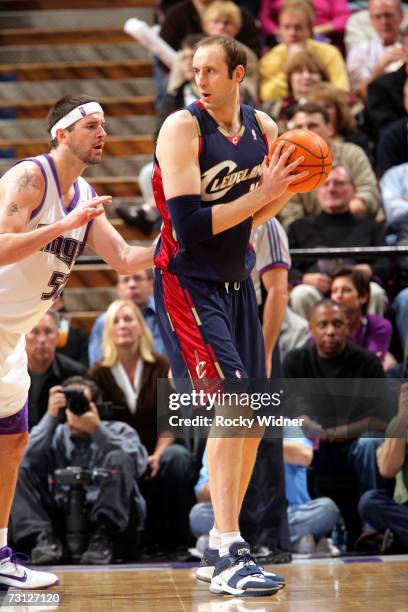 Zydrunas Ilgauskas of the Cleveland Cavaliers is defended by Brad Miller of the Sacramento Kings during the game at Arco Arena on January 9, 2007 in...