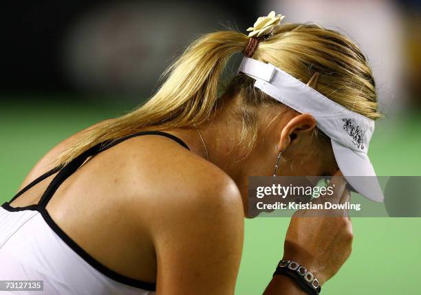 Maria Sharapova of Russia shows her frustration during her women's final match against Serena Williams of the USA on day thirteen of the Australian...