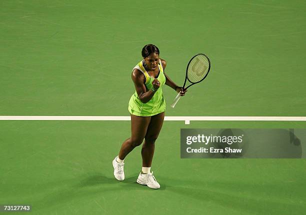 Serena Williams of the USA celebrates winning a point during her women's final match against Maria Sharapova of Russia on day thirteen of the...