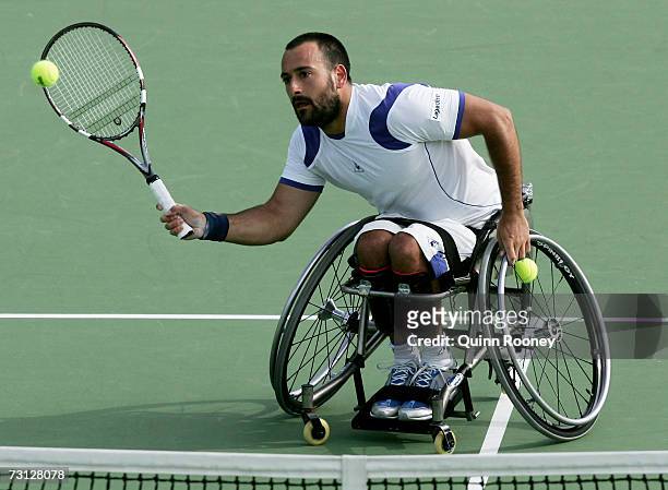 Michael Jeremiasz of France plays a forehand during his wheelchair final match against Shingo Kunieda of Japan on day thirteen of the Australian Open...