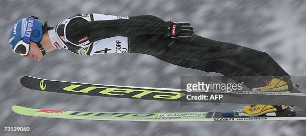 Arttu Lappi of Finland competes in the Ski Jumping World Cup 27 January 2007 in Oberstdorf, southern Germany. AFP PHOTO DDP/OLIVER LANG GERMANY OUT