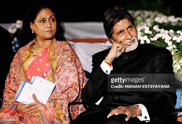 Indian film actor Amitabh Bachchan and his wife Jaya Bachchan look on during a function at the French Embassy in New Delhi, 27 January 2007, during...