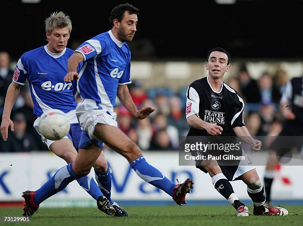 Leon Britton of Swansea City fires in a shot at the goal during the FA Cup sponsored by E.ON 4th Round match between Ipswich Town and Swansea City at...