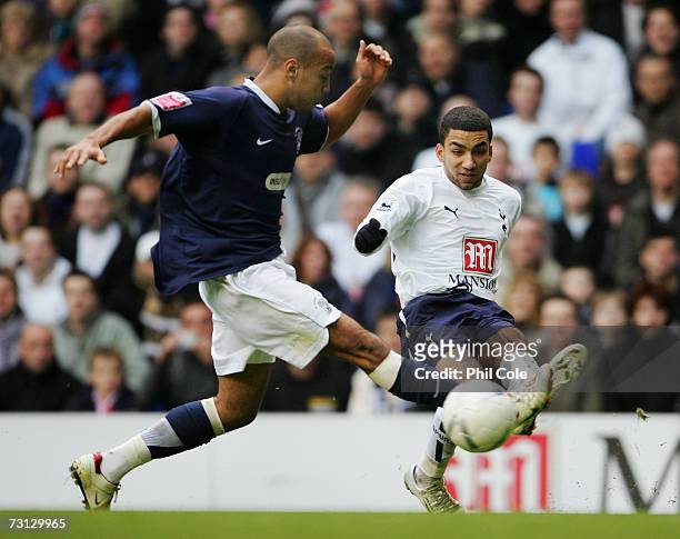 Aaron Lennon of Tottenham Hotspur gets his cross in ahead of Lewis Hunt of Southend United during the FA Cup sponsored by E.ON Fourth Round match...