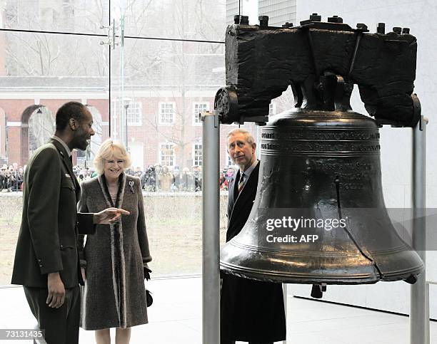 Philadelphia, UNITED STATES: As a Park Ranger describes the history of the Liberty Bell to Britain's Camilla, Duchess of Cornwall, her husband Prince...