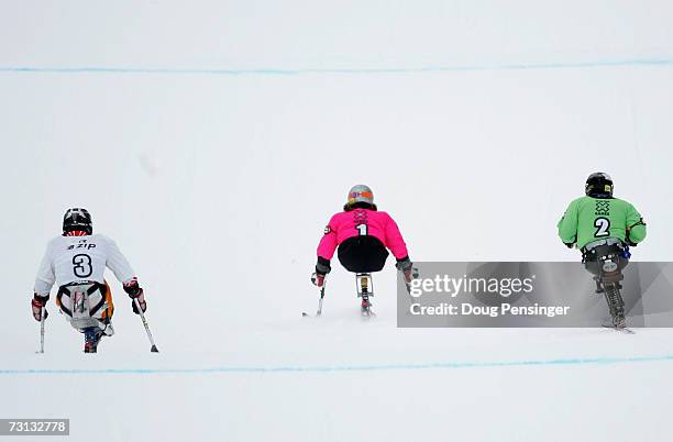 Tyler Walker, from Franconia, New Hampshire, center, leads Kevin Connolly, from Bozeman, Montana, right and Kees-Jan van der Klooster from...