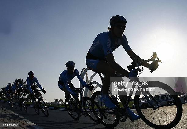 Members of Italian team Milram ride their bicycles during the first stage of the 6th edition of the Tour of Qatar cycling race, a team time-trial, in...