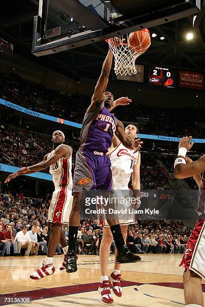Amare Stoudemire of the Phoenix Suns dunks on Zydrunas Ilgauskas of the Cleveland Cavaliers on January 28, 2007 at The Quicken Loans Arena in...