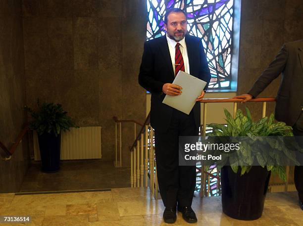 Israeli Minister for Stategic Threats, Avigdor Lieberman of the Yisrael Beitenu party, stands in the hallway of the Prime Ministry as the cabinet...