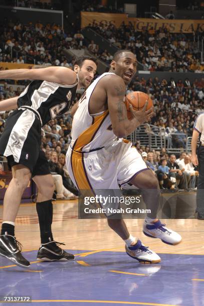 Kobe Bryant of the Los Angeles Lakers drives to the hoop against Manu Ginobili of the San Antonio Spurs on January 28, 2007 at Staples Center in Los...