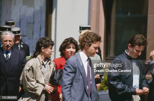 Christine Villemin , Jean-Marie Villemin and other members of the family of murdered four year-old, Grégory Villemin, leaving the town hall in...