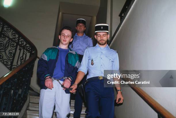 Jean-Marie Villemin handcuffed in police custody, at the courthouse in Saverne in the Bas-Rhin department, during his trial for the murder of Bernard...