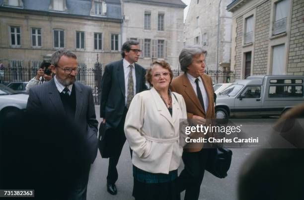 Albert and Monique Villemin, grandparents of murdered four year-old boy Grégory Villemin with lawyer Paul Lombard , in Dijon for a court hearing in...