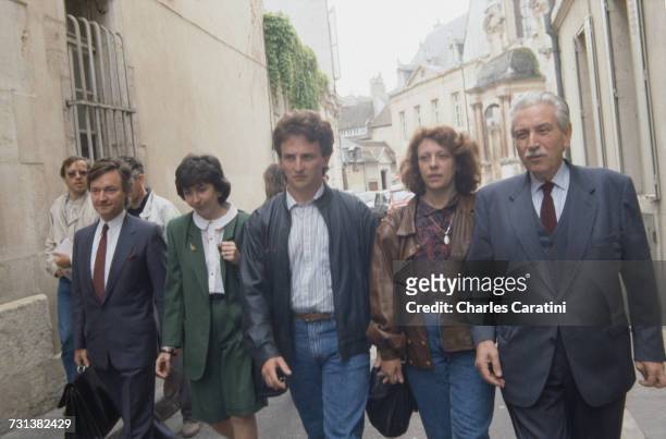 Jean-Marie Villemin and his wife, Christine , with their lawyer, Henri-René Garaud , on their way to testify in the case of the murder of their four...