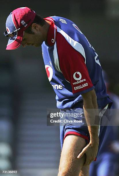 Michael Vaughan of Engand holds his injured leg during the England nets session at the WACA on January 29, 2006 in Perth, Australia.