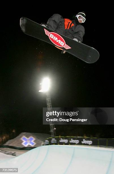 Steve Fisher of Breckenridge, Colorado, goes airborne above the superpipe during practice before winning the gold medal in the men's Snowboard...