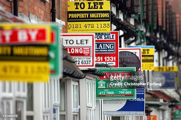 For Sale and To Let boards advertise properties in Selly Oak on 29 January, 2007 in Birmingham, England, House prices in Britain are to rise by up to...
