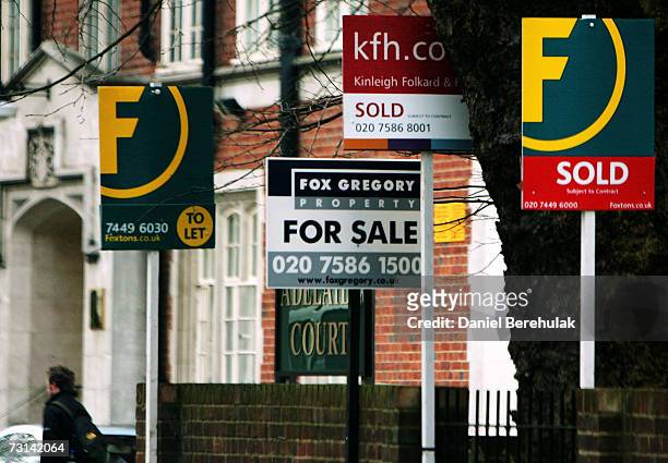For Sale signs are pictured in on January 29, 2007 in London, England. Despite recent interest rate rises, UK house prices are expected to rise by...