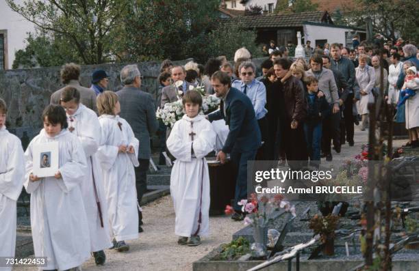 The funeral of murdered four year-old boy Grégory Villemin takes place in Lepanges Sur Vologne, Vosges, France, 20th October 1984. Behind the coffin...