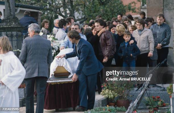 The funeral of murdered four year-old boy Grégory Villemin takes place in Lepanges Sur Vologne, Vosges, France, 19th October 1984. Behind the coffin...