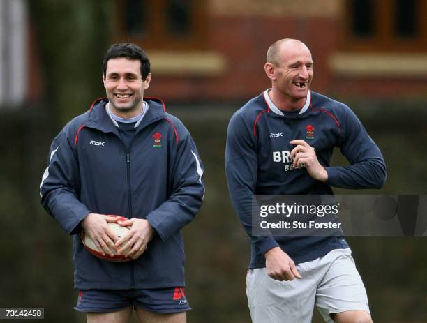 Wales captain Stephen Jones cracks a joke with Gareth Thomas during Wales Rugby Union training at Sophia Gardens on January 29, 2007 in Cardiff,...