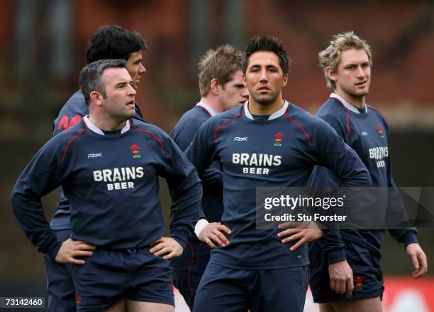 Wales back Gavin Henson looks on as Mefin Jenkins looks bemused during Wales Rugby Union training at Sophia Gardens on January 29, 2007 in Cardiff,...