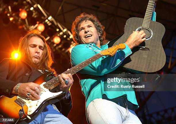Chris Anderson and Henry Paul of the group Blackhawk perform at FanFair, the world's largest country music festival, June 14, 2002 in Nashville,...