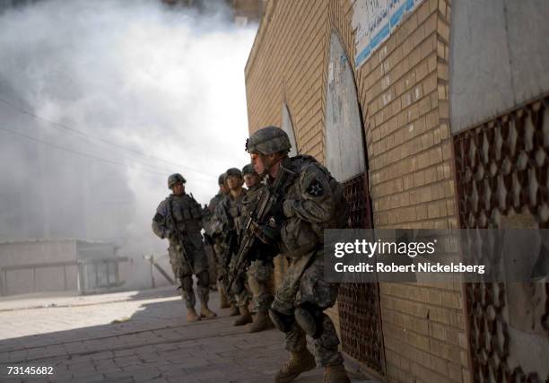 In a combined effort to disrupt Sunni insurgents and Shia militias US Army soldiers from 1st Platoon, Bravo Company, 3/2 Stryker Brigade Combat Team...