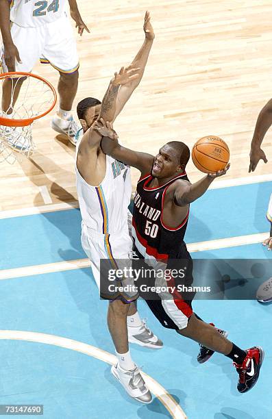 Zach Randolph of the Portland Trail Blazers gets to the basket past Tyson Chandler of the New Orleans/Oklahoma City Hornets on January 29, 2007 at...