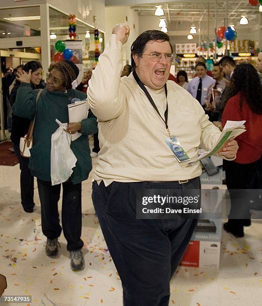 Customer Thomas Richardson reacts at a release party for the new Windows operating system Vista held at a CompUSA store January 29 in Houston. More...