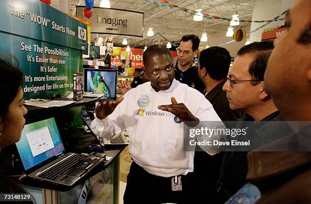 Microsoft's Jovita Nsoh describes the features of Vista during a software release party for the operating system at a Comp USA store, January 30 in...