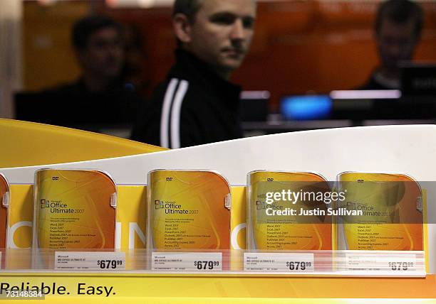 Customer at a Comp USA store looks at a display of the new Microsoft Office Ultimate 2007 January 29, 2007 in San Francisco, California. More than...