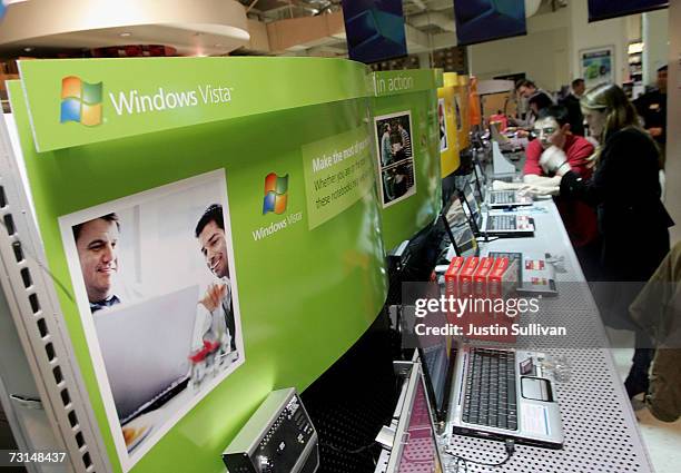 Comp USA customer tests a laptop running the new Microsoft Vista operating system January 29, 2007 in San Francisco, California. More than five years...