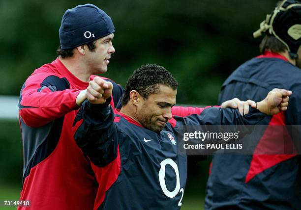 England rugby-union players Andrew Farrell and Jason Robinson attend an England squad training session at Bath University, in south-west England, 30...