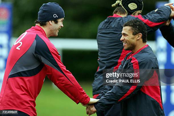 England rugby-union players Andrew Farrell and Jason Robinson attend an England squad training session at Bath University, in south-west England, 30...