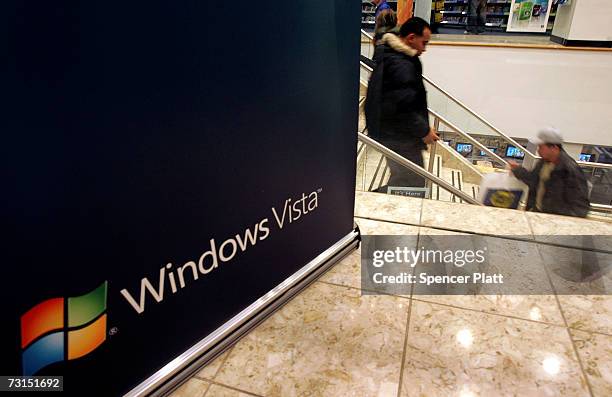 A sign advertises the new Windows Vista software at a Best Buy store January 30, 2007 in New York City. Microsoft launched the Windows Vista...