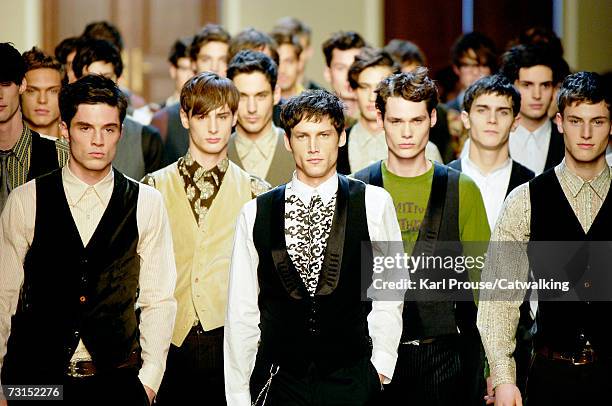 Models walk down the catwalk during the Paul Smith fashion show as part of Paris Menswear Autumn/Winter 2007 on January 28, 2007 in Paris, France.