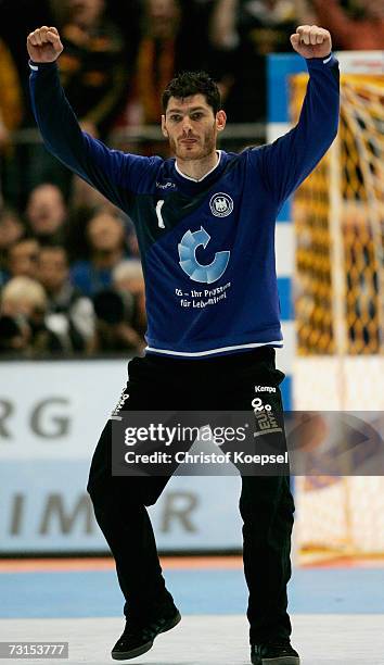 Henning Fritz of Germany celebrates a goal during the IHF World Championship quarter final game between Germany and Spain at the Cologne Arena on...