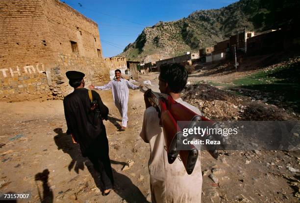 Transportation of rifles from the factory to the gun room in the Pashtun tribal zone on July, 2004 in Darrah, Pakistan.