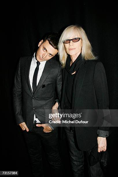 Heidi Slimane with Betty Catroux attends the Dior Men Fashion Show Autumn Winter 07 08, on January 30, 2007 in Paris, France.