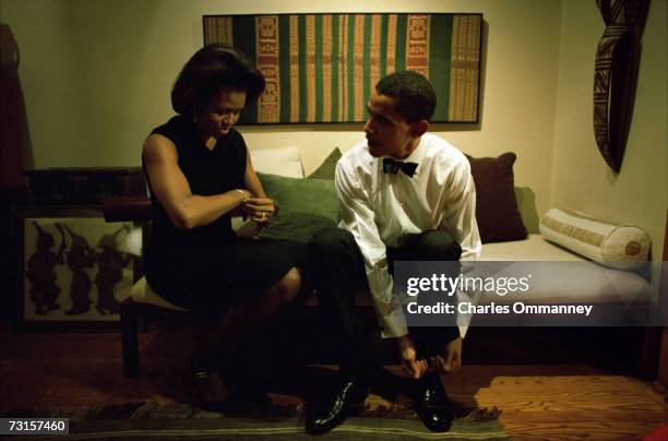 Democratic Senator Barack Obama and his wife, Michelle get ready at their home on December 8, 2004 in Chicago, Illinois. The Senator will give the...