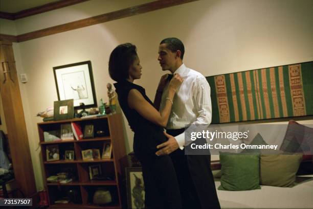 Democratic Senator Barack Obama and his wife, Michelle get ready at their home on December 8, 2004 in Chicago, Illinois. The Senator will give the...