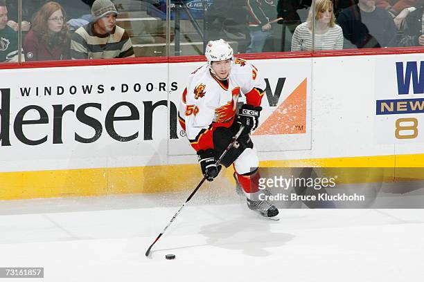 David Moss of the Calgary Flames skates against the Minnesota Wild during the game at Xcel Energy Center on January 26, 2007 in Saint Paul,...