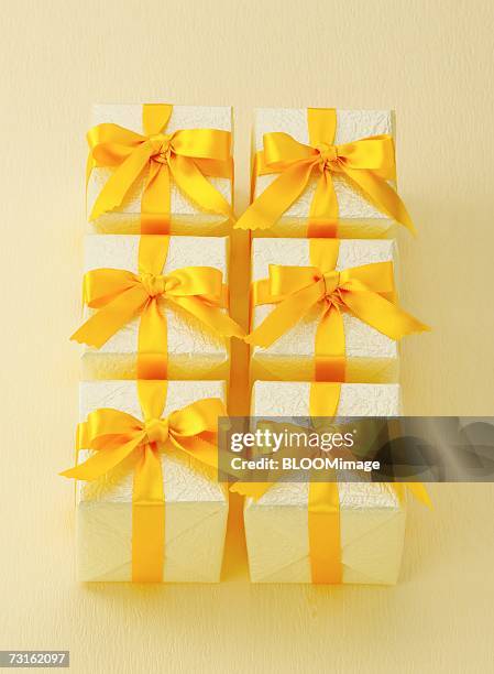 Wrapping Yellow Ribbon Gift Yellow Ribbon Photos and Premium High Res Pictures - Getty Images
