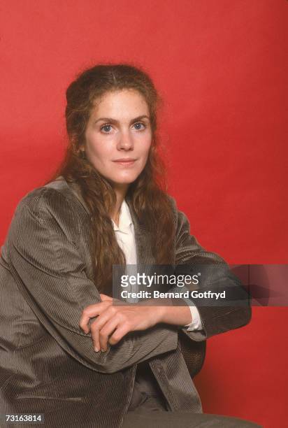 American comic actress Julie Hagerty poses for a portrait in a corduroy jacket with her arms folded, early 1980s.