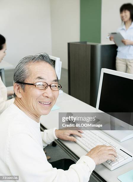 Old Man Computer Stock 215 Pc 60 3 Stock Photos, High-Res Pictures, and Images - Getty Images