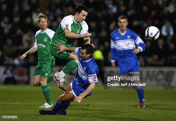 Allan McManus of St Johnstone tackles Gueillaume Beuzelin of Hibernian during the CIS Insurance Cup semi final at Tynecastle Park on January 31, 2007...